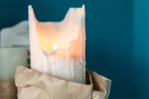 istock Beautiful candle lights, home on fireplace, Christmas decoration 902719322