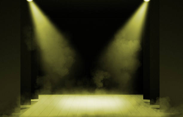 istock Stage lights ,free stage,concerrt stage .Several projectors on the ceiling. Spotlight strike through the darkness to the floor. 902720030