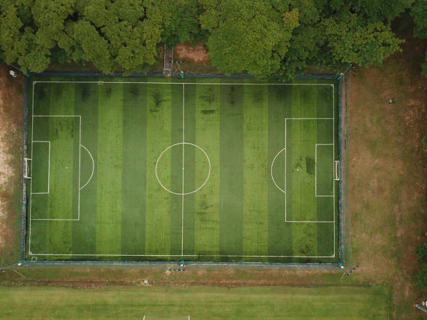 istock Soccer field from bird eye view 902720236