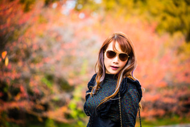 istock Asian woman in autumn 902745966