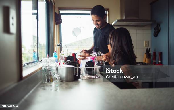 Helping Dad In Kitchen Stock Photo - Download Image Now - New Zealand, Faucet, Kitchen