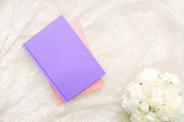 istock the book with bouquet on the white background 902747288