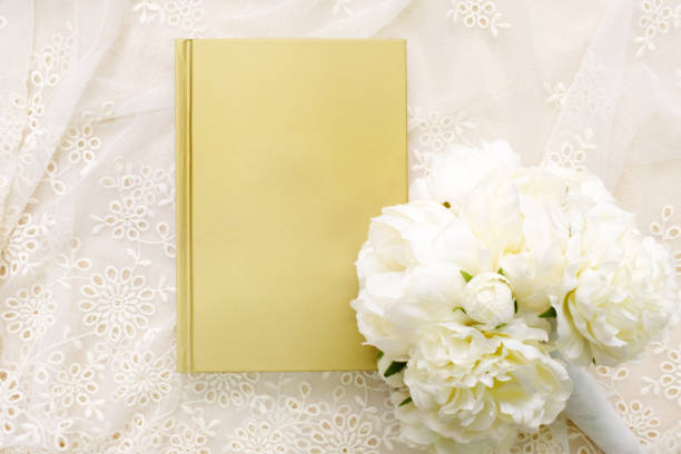 istock the book with bouquet on the white background 902747296
