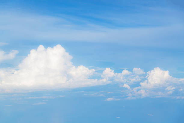 istock landscape with clouds. Cumulus clouds in the sky. 902754376