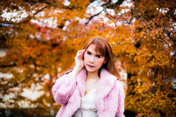 istock Asian woman in autumn 902754552
