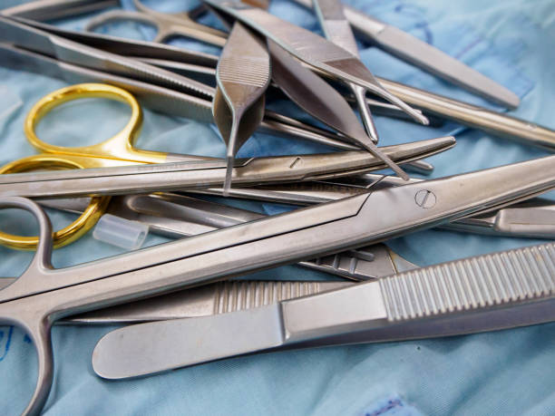 istock Pile of surgical instruments on sterile drape 902756758