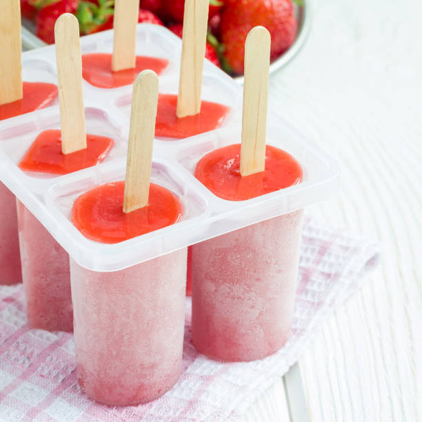 istock Homemade popsicles with strawberry and banana, square 902757344