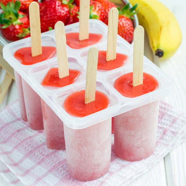 istock Homemade popsicles with strawberry and banana, square format 902757350