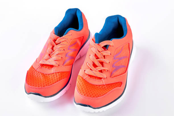 istock Sport trainers on white background. 902760474