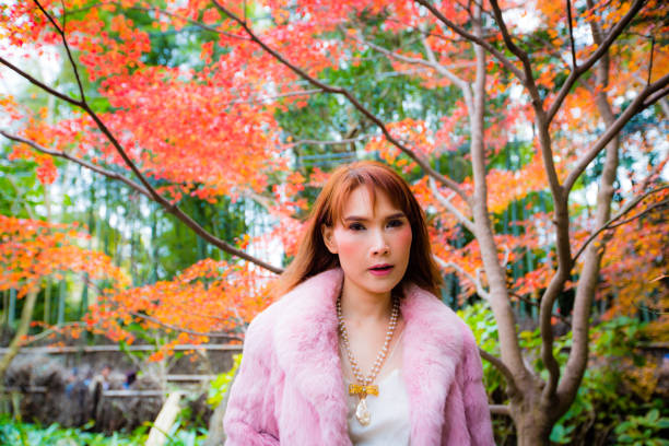 istock Asian woman in autumn 902760590