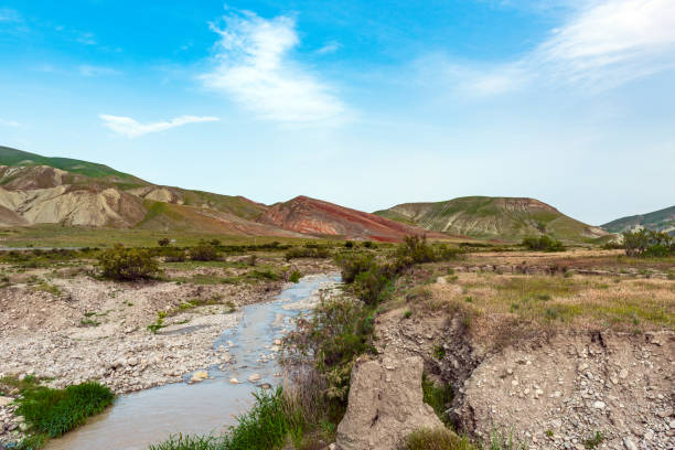 istock River in amazing red mountains 902780856