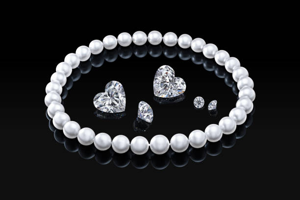 istock Luxury set white pearl necklace and diamonds on a black background with glossy reflection and blank  template for your design  or copy space  your text 902789854