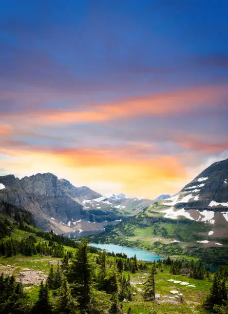 View of mountains and lake at Glacier National Park in Montana