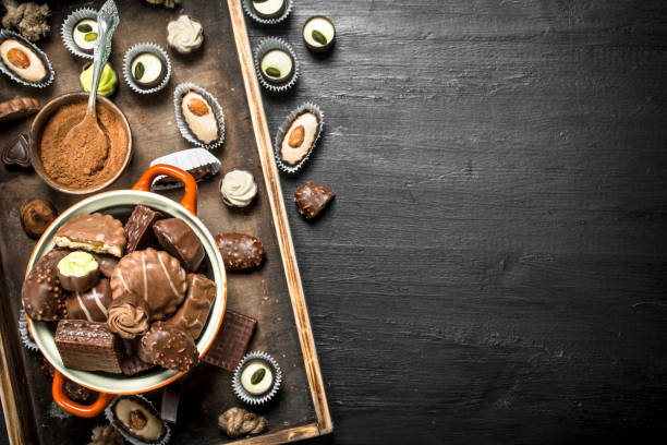 istock Chocolate candies in a bowl. . 902793502