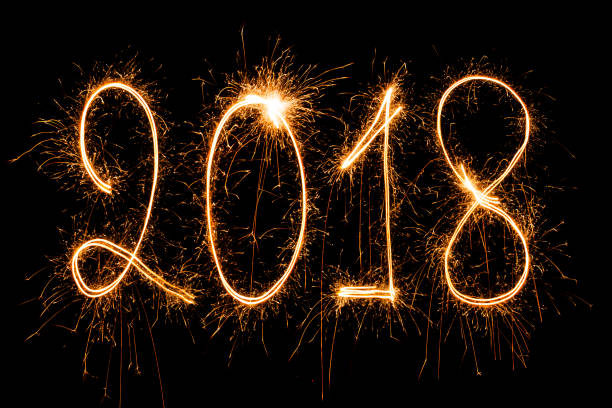 istock 2018 written with Sparkle firework,happy new year 902794654