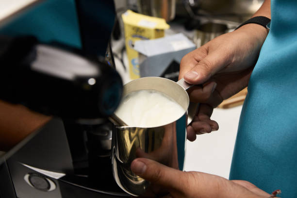 istock Coffee cappuccino. Work barista. Preparation of drink1 902800696