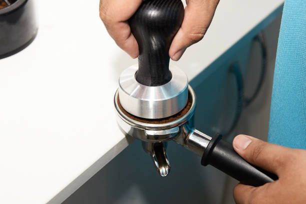 istock Ground coffee. Sentence of drink. Work barista 902800712