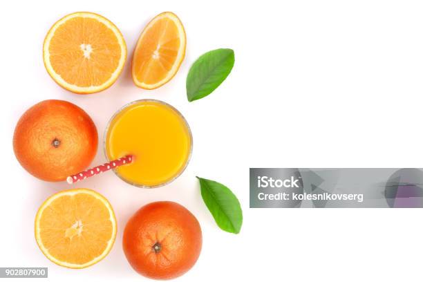 Orange Juice Glass With Slices Of Citrus And Leaves Isolated On White Background With Copy Space For Your Text Top View Stock Photo - Download Image Now