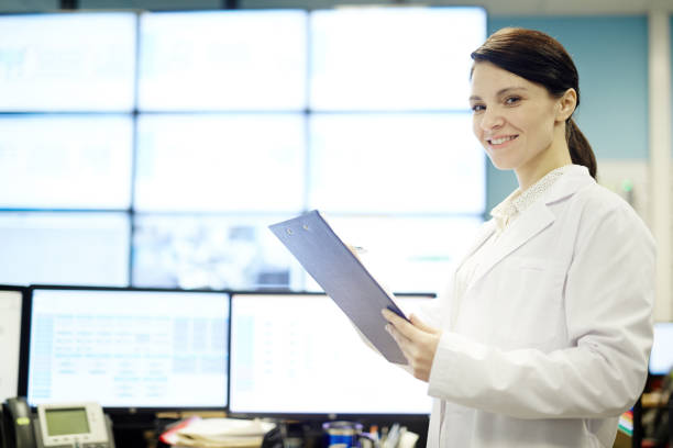 istock Happy female engineer of bitcoin mining company 902808050