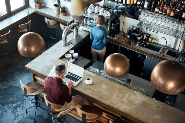 istock Working in his favourite coffee shop 902808164