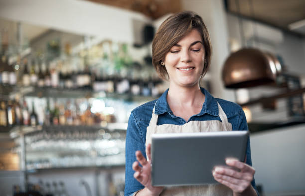 istock Keeping her business ahead with the help of technology 902808232