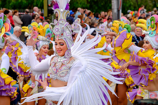 It's February and people in stunning costumes celebrate the carnival taking part in the famous parade on the seafront of Santa Cruz de Tenerife. The Carnival of Santa Cruz de Tenerife is considered the second most popular carnival in the world, after the one of Rio de Janeiro.