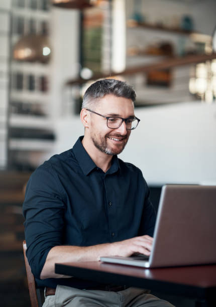 istock Putting the finishing touches on his business plan 902811338