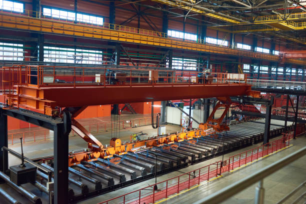 Modern innovative industrial machine processing tubes in line with powerful tools