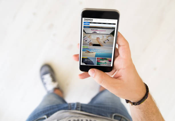 istock male hand trends magazine smart phone 902819358