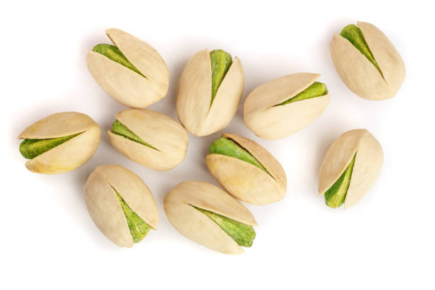 istock Pistachios isolated on white background, top view. Flat lay 902823706