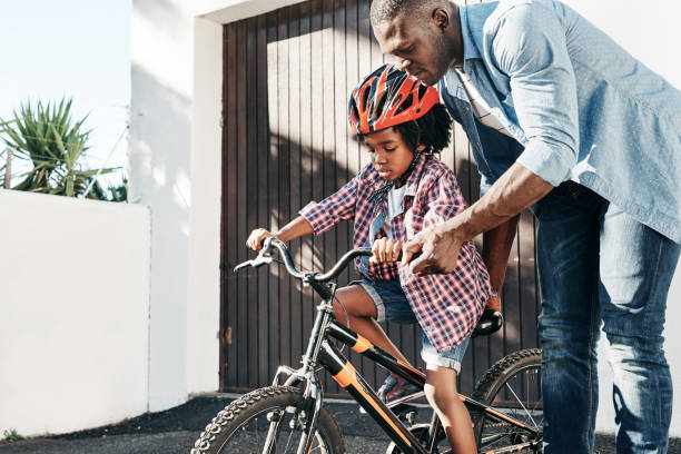 istock You will riding a bike in no time my son 902827402