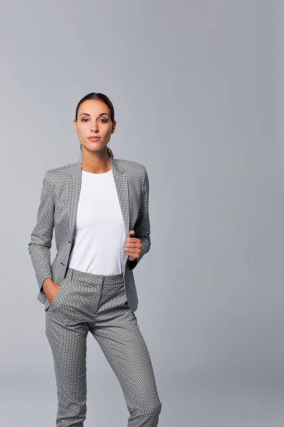 istock Confident young female professional wearing suit 902830278