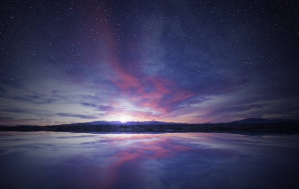 idílico amanecer en el cielo reflejando en el agua - twilight fotografías e imágenes de stock