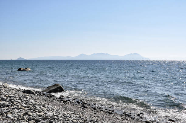 istock Pebble beach in Italy with Elba 902836136