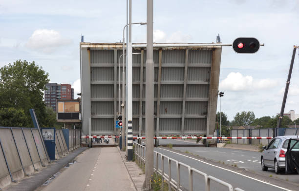 istock Bridge opening for the boats, closing for the traffic 902838242