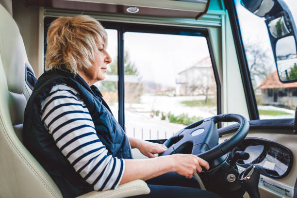 istock Woman driving the caravan on the vacation 902838292
