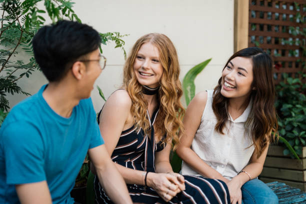 istock Asian and European friends on student exchange 902841948