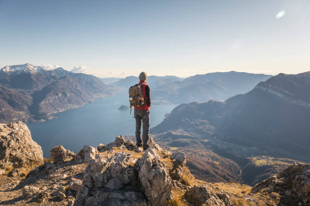 istock Hiker alone on top of the mountain 902842300