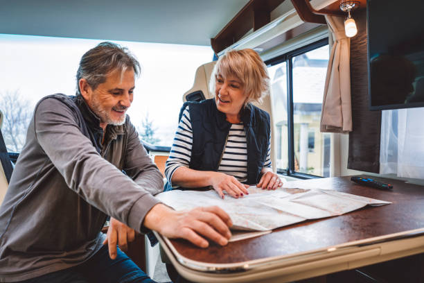 istock Couple enjoying their alone time in the luxurious RV 902843164