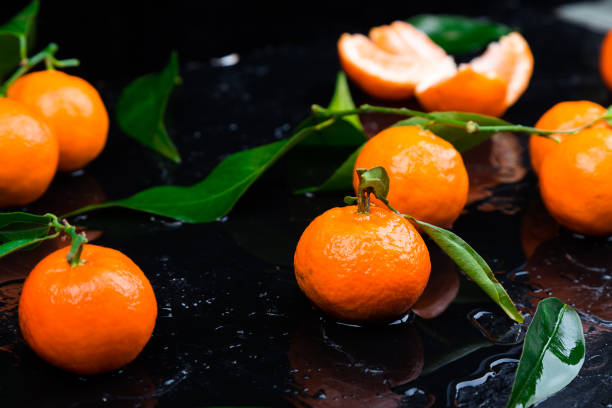 istock Tangerines background. Delicious and beautiful Citrus. 902847240