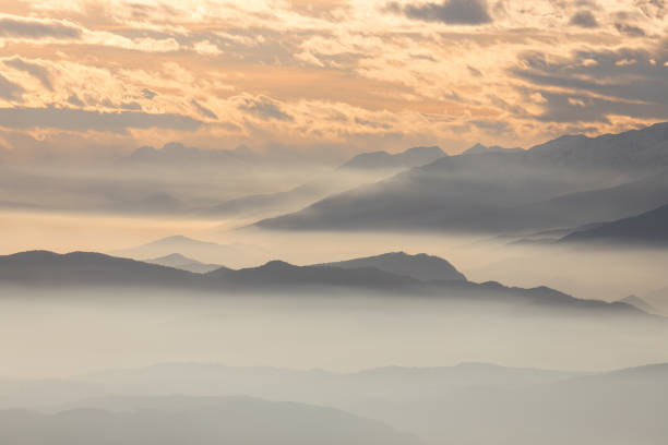 istock Foggy mountain silhouette landscape 902847618