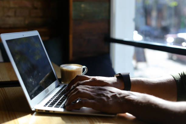 istock Insurance agent checks mail on laptop 902851346
