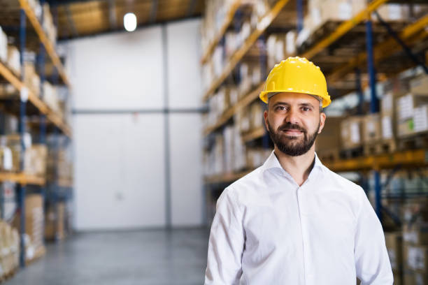 istock Portrait of a male warehouse worker or supervisor. 902864300