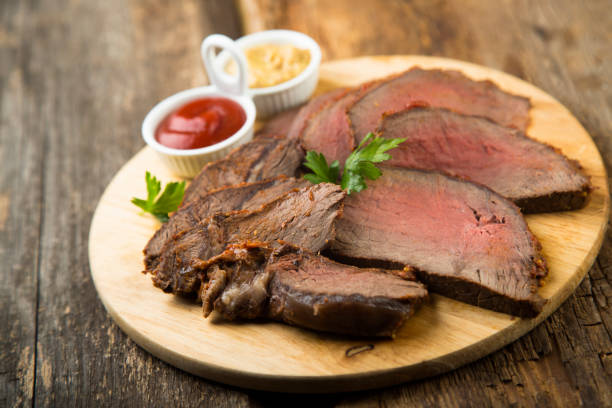 carne de res asada  - round of beef fotografías e imágenes de stock