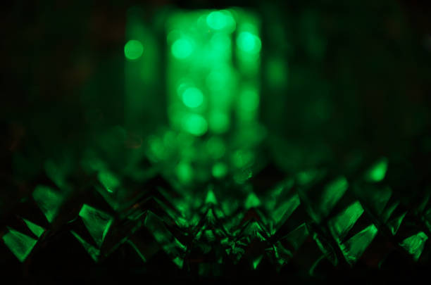 istock Close up of cut crystal in mysterious emerald light.Magic shiny background. 902867518
