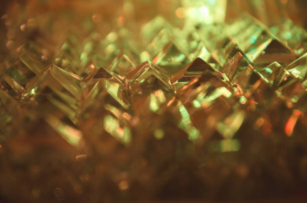 istock Close up of cut crystal in mysterious amber light.Magic shiny background. 902867568