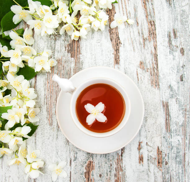 istock Cup of tea with jasmine flowers 902870450