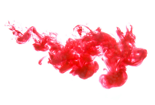 abstract red pink ink in water color dissolving in water