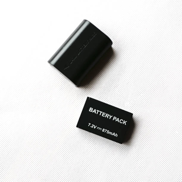 istock Battery pack exclusive for small single lens reflex camera on background white color 902871420