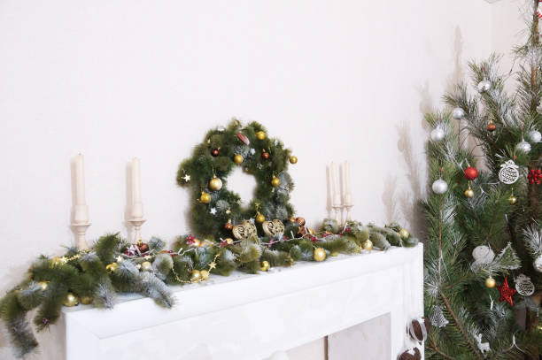 istock Christmas decorations with fir branches, candles, balls, heart figurines 902879672